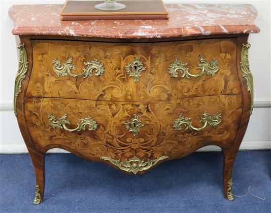 A serpentine marquetry commode with marble top W.122cm